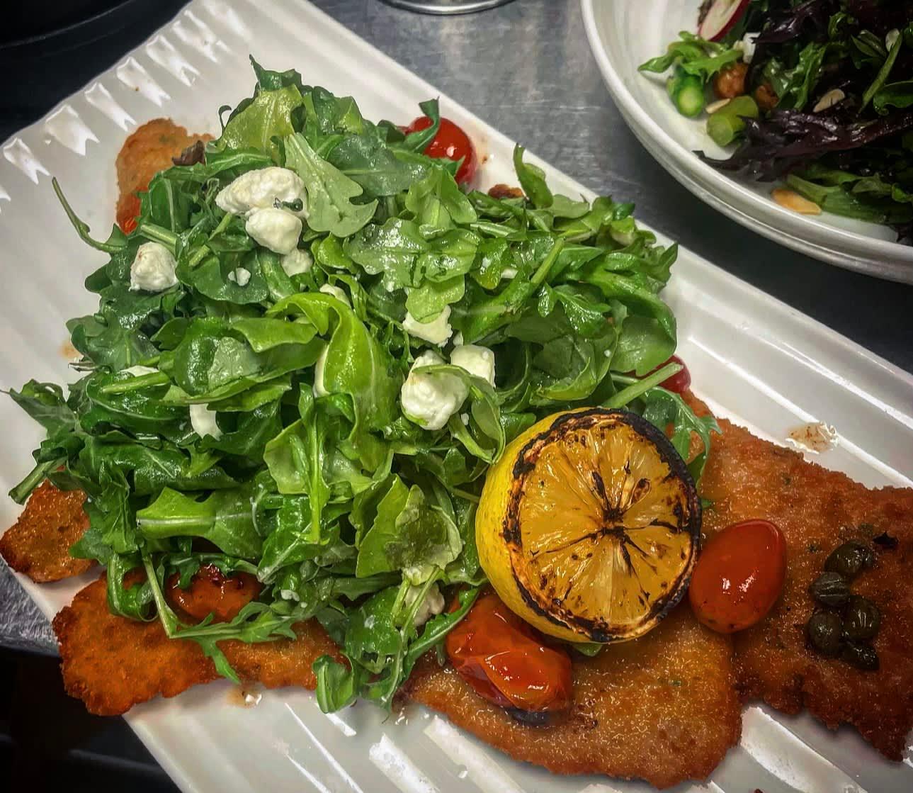 Spring Menus Are Here!

FEATURING
Berkshire Pork Milanese
Baby Arugula, Vermont Fresh Goat Cheese, Tomato Confit, Lemon-Caper Brown Butter